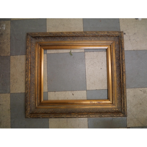 392 - A rectangular gilt picture frame