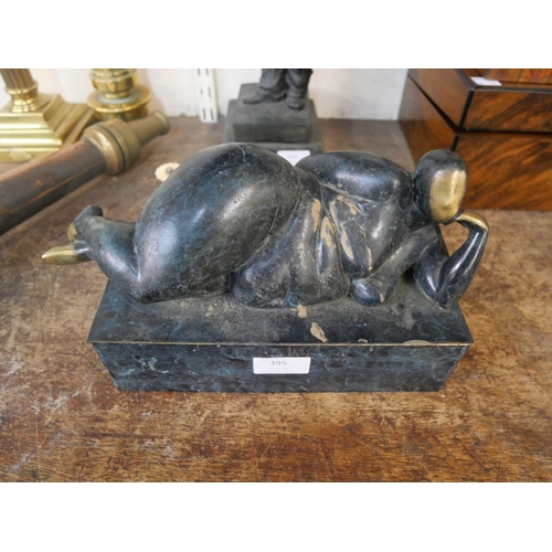 395 - A Surrealist style bronze figure of a reclining female