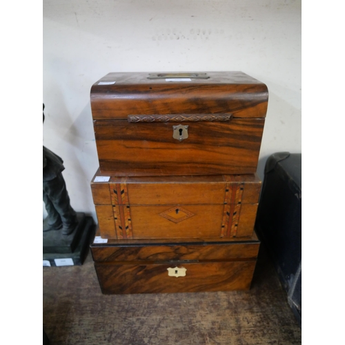 396 - A Victorian walnut writing slope and two Victorian jewellery boxes