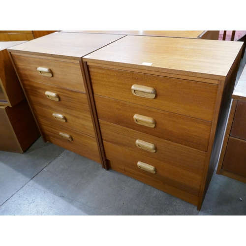 57 - A pair of teak chests of drawers