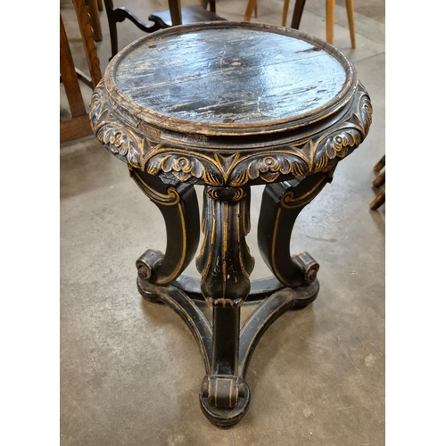 93 - A 19th Century style Italian ebonised and parcel gilt jardiniere stand