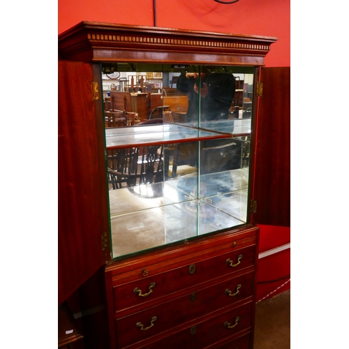 99 - A George III style mahogany cocktail cabinet