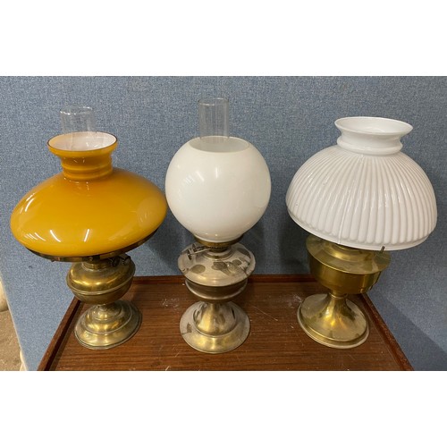 355 - Three assorted oil lamps