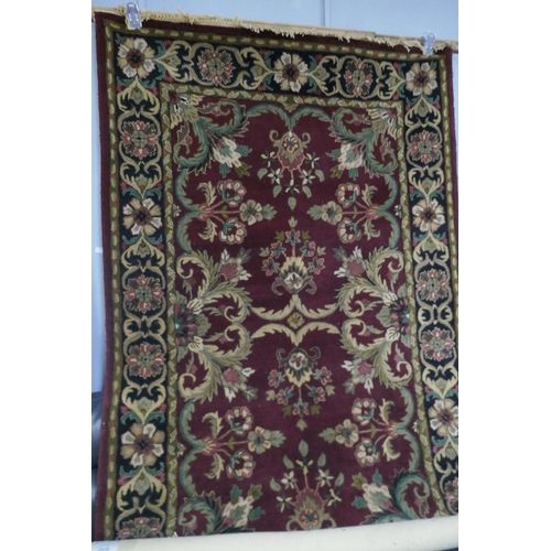 1343 - An Indian hand woven full wool pile tea washed Agra rug, 230 x 160