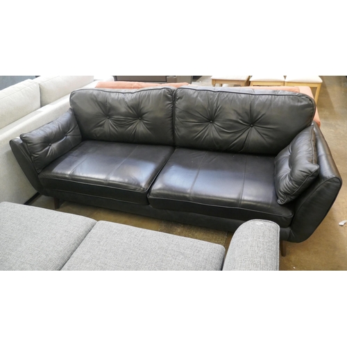 1376 - A black leather three seater sofa
