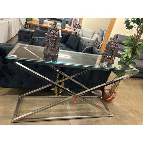 1377 - A glass and chrome console table - Boxed * this lot is subject to VAT