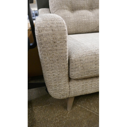 1403 - An oatmeal weave three seater sofa