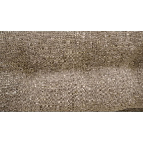 1403 - An oatmeal weave three seater sofa