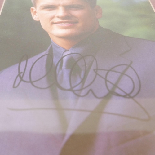 602 - A signed picture of Michael Owen, framed