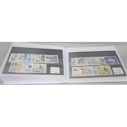 633 - Stamps; a small album of better mint and used European stamps in sets and singles on 27 no. stockcar... 
