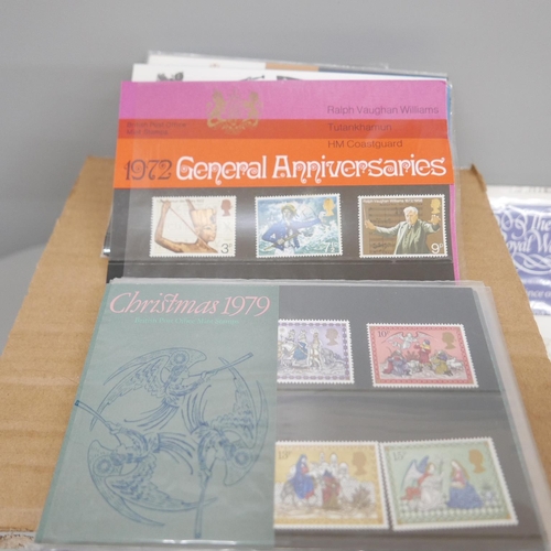 635 - Stamps; a box of GB small format pre and post decimal presentation packs (60 no.)