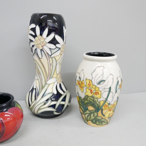 644 - A Moorcroft Rose Red vase designed by Emma Bossons, Seaside Pansy vase, Phoebe Summer vase and a lim... 
