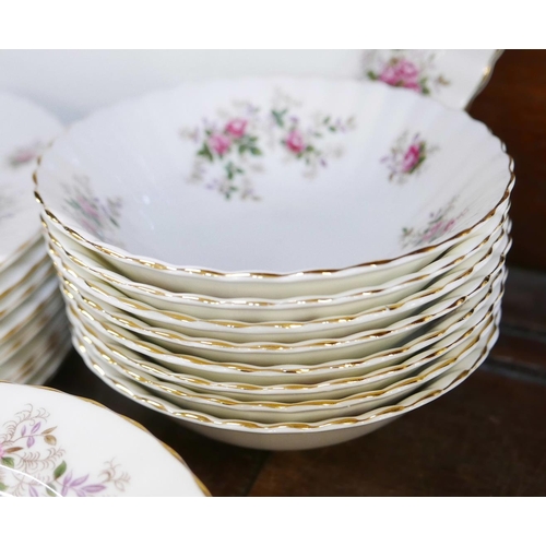 651 - Royal Albert Lavender Rose eight setting dinnerwares with two side plates, oval serving plate and a ... 