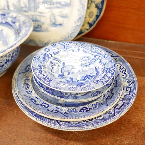 661 - A collection of blue and white china including a meat plate with scene of Nuneham Park, marked Godwi... 