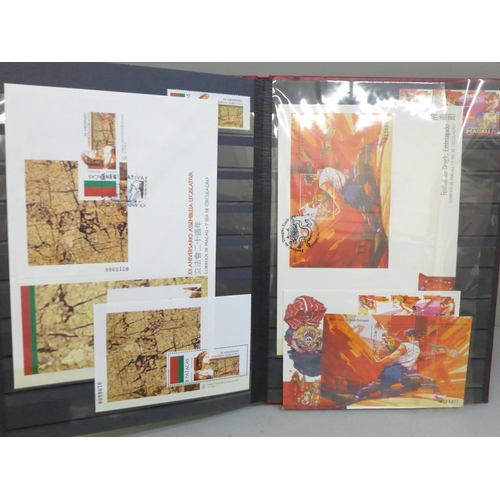 662 - Stamps; a stockbook of Macau stamps, mini sheets and first day covers from 1996 and 1997