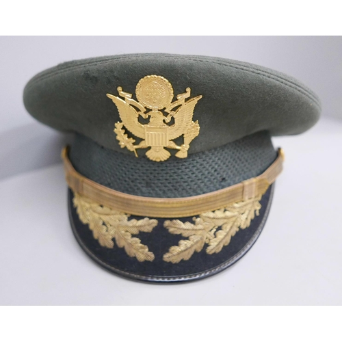 667 - A US Military peaked cap belonging to Lt. Col. Theo C. Florey, WWII and Korea served, recipient of t... 