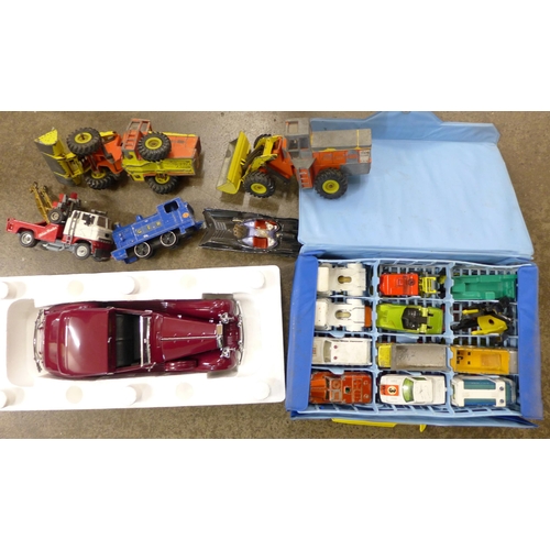 682 - A collection of die-cast model vehicles, Dinky Toys, Matchbox including a collectors case, all playw... 