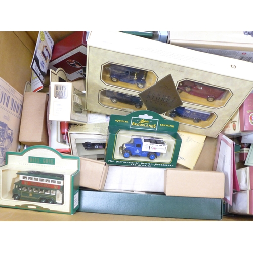 689 - A box of Lledo model vehicles, Comedy Classics, The Spirit of Brooklands, Famous Stores of London, D... 