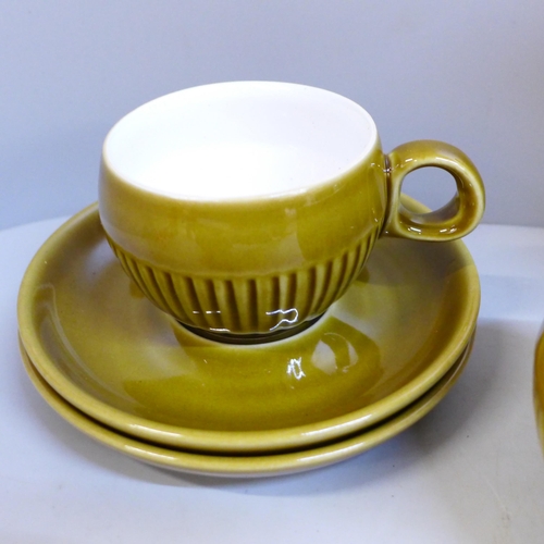 697 - A Langley Pottery coffee set; six cups, six saucers, a milk jug, sugar bowl and coffee pot