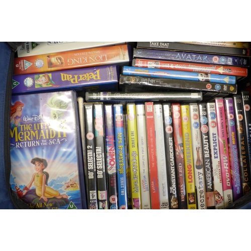706 - A large collection of DVDs, VHS including Disney, comedy, etc.