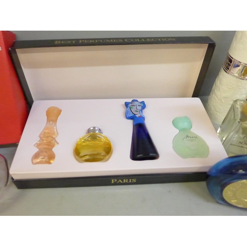 718 - A collection of perfumes