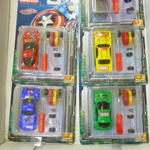 722 - A box of Marvel Superheroes motorised model kits, eleven in total
