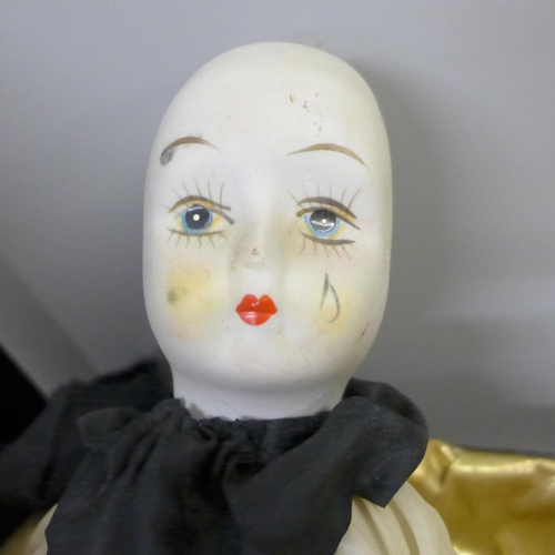 727 - Four costume dolls; three Pierrot and one other, in associated boxes