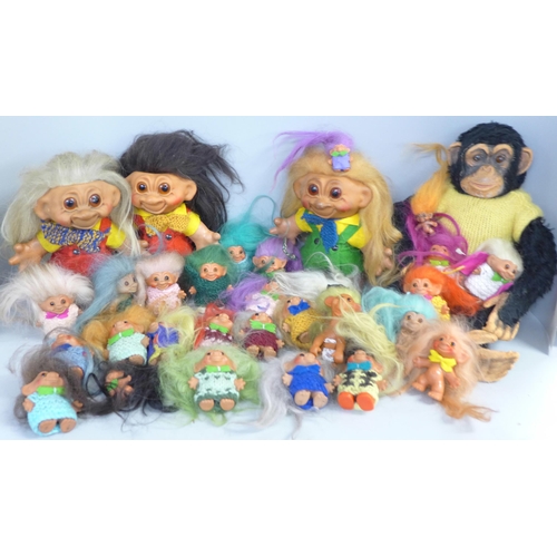 734 - Twenty-nine Troll figures and a chimpanzee figure, (3 large, 26 small, chimpanzee hand a/f)