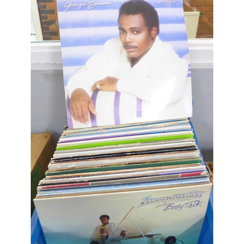 739 - A box of over eighty 1980s and later LP records and 12