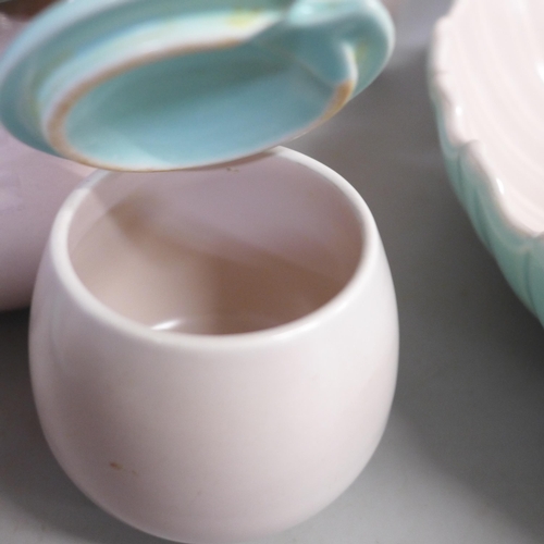 741 - A collection of Poole twintone pink and green pottery