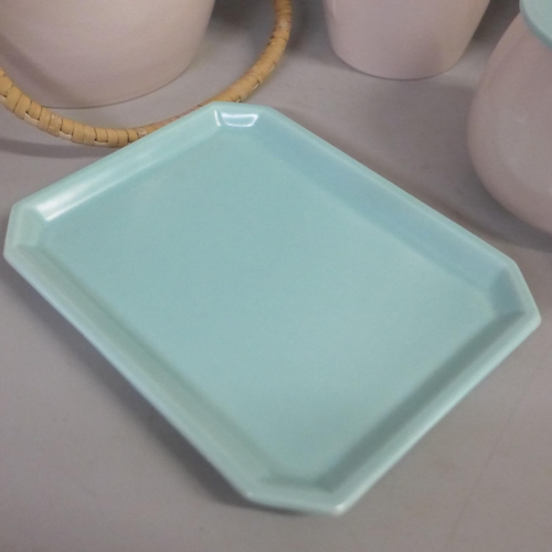 741 - A collection of Poole twintone pink and green pottery
