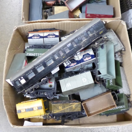 744 - A collection of model railway wagons, a canal railway diorama and collection of diorama buildings, s... 