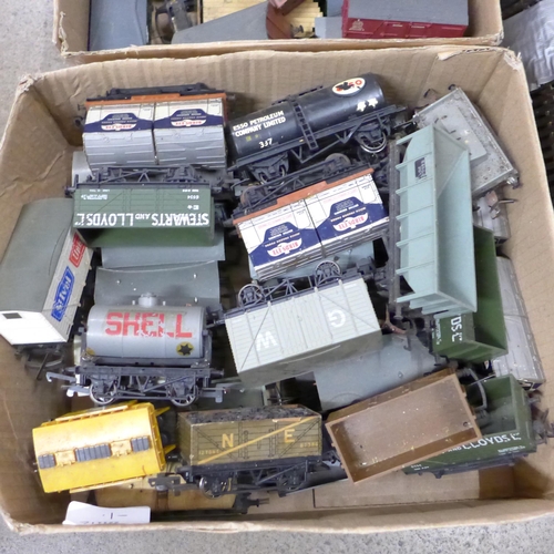 744 - A collection of model railway wagons, a canal railway diorama and collection of diorama buildings, s... 