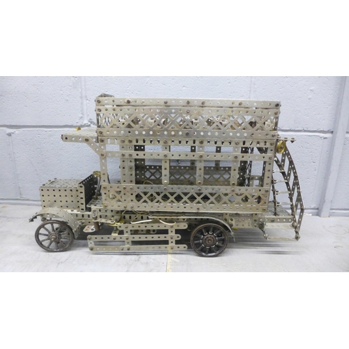 747 - A nickel Meccano London bus with working steering and clockwork motor driving the rear wheels, circa... 