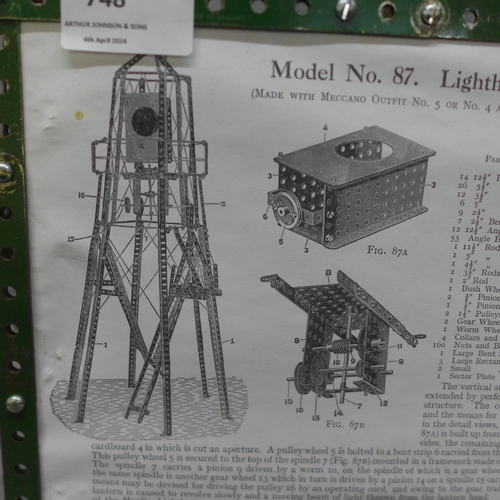 748 - A nickel Meccano model of a lighthouse with revolving light, circa 1913, model no. 87, 90cm
