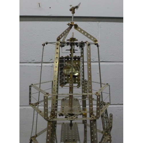 748 - A nickel Meccano model of a lighthouse with revolving light, circa 1913, model no. 87, 90cm