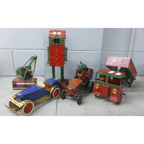 753 - Five Meccano models; tipper truck, tow vehicles, a robot and crane
