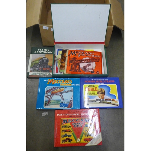 757 - A box containing Meccano and train books and Meccano instruction booklets