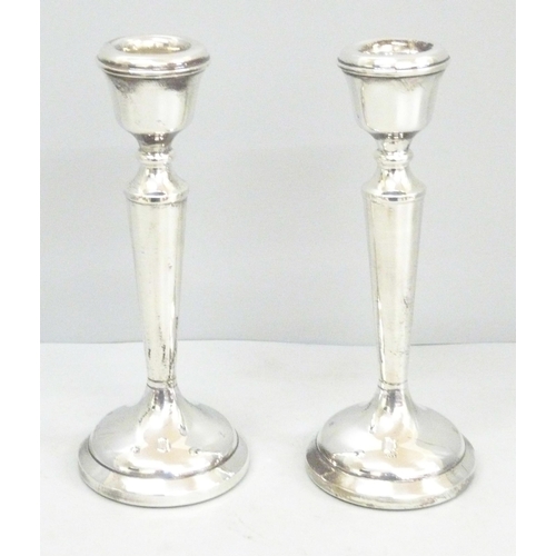 799 - A pair of silver candlesticks, Birmingham marks, 16cm