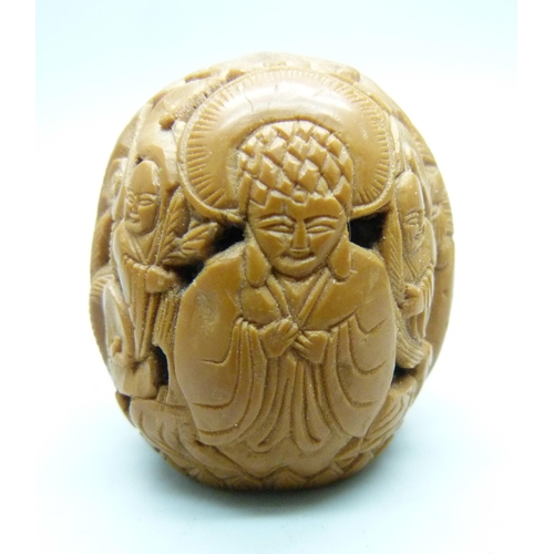 810 - A Cornish Serpentine carved model frog, a carved walnut with Buddha detail, a/f, and a Japanese scre... 