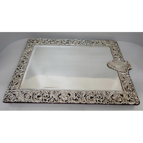 816 - A large silver framed mirror, London 1911, 33.5cm wide