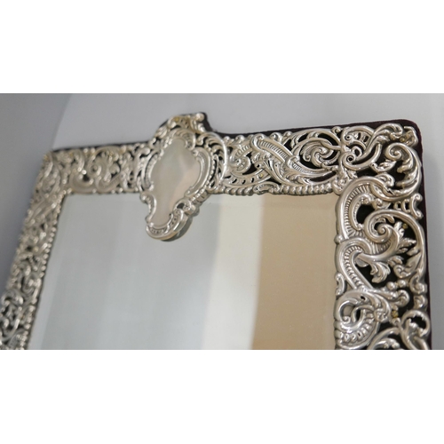 816 - A large silver framed mirror, London 1911, 33.5cm wide