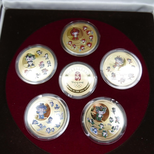 858 - A Beijing Olympics Ltd Young Master Athletics commemorative medallion set, made from gilt copper, no... 