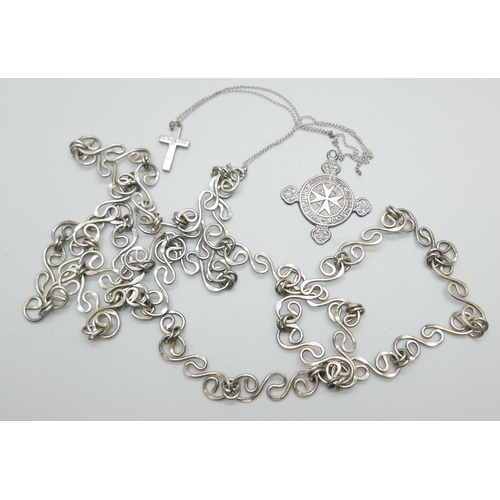 864 - A large scroll design 925 silver necklace, a silver cross pendant and chain and a silver St. Johns m... 