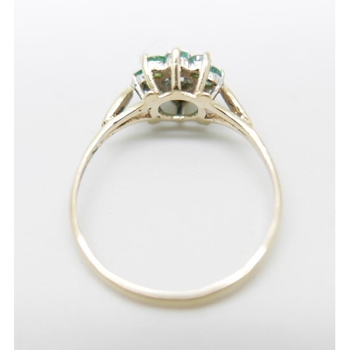 874 - A 9ct gold, emerald and diamond cluster ring, 1.1g, L/M