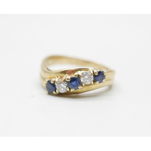 876 - An 18ct gold, sapphire and diamond five stone ring, 5g, M