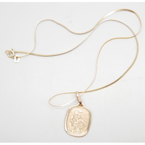 878 - A 9ct gold St. Christopher on a 9ct gold chain, 2.7g, chain 37cm