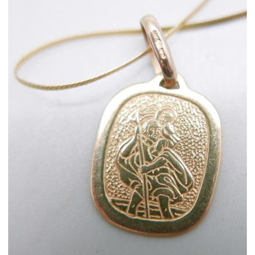 878 - A 9ct gold St. Christopher on a 9ct gold chain, 2.7g, chain 37cm