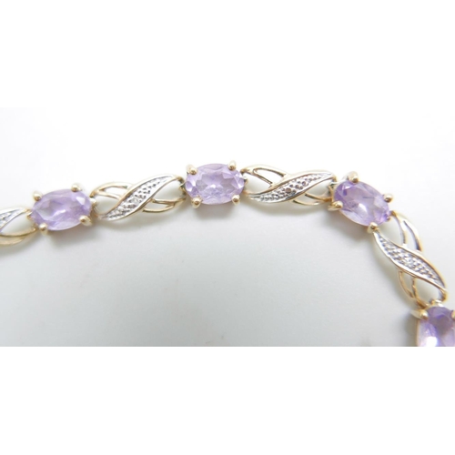 879 - A 9ct gold, amethyst and diamond bracelet, 6.6g,  19cm