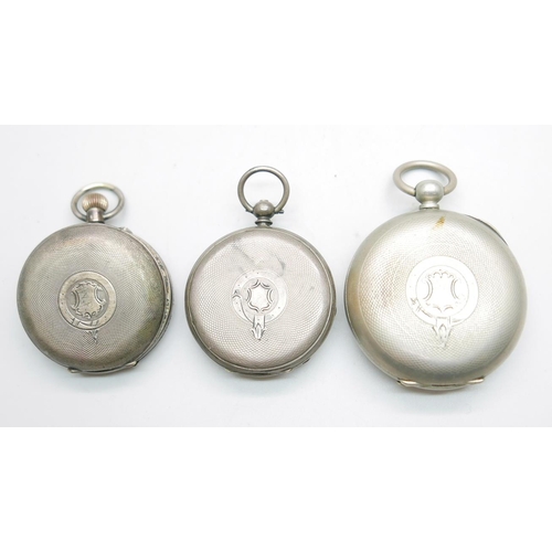 880 - Two pocket watches, one marked fine silver, one marked 800, and one other pocket watch, a/f